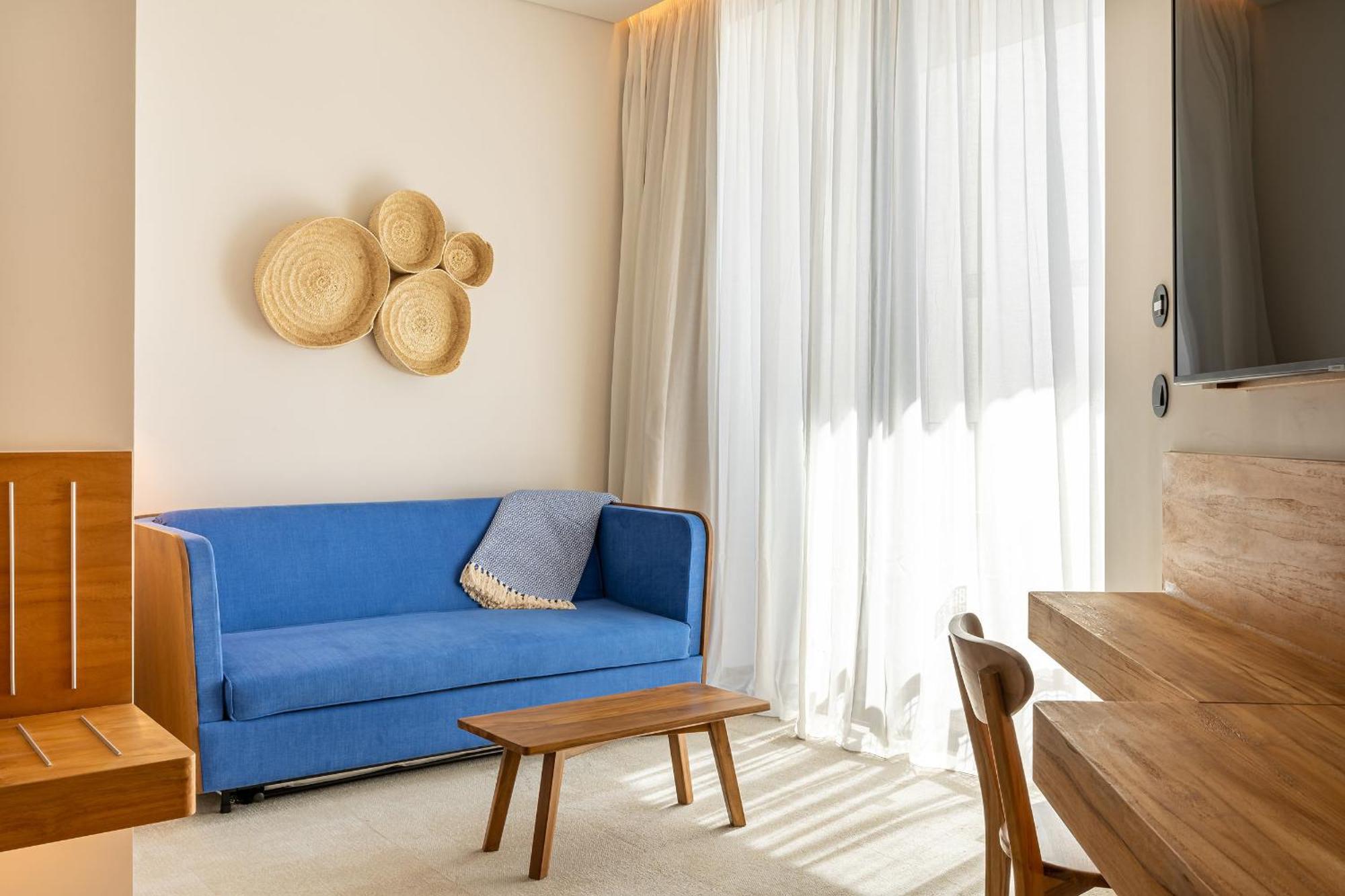 3HB Faro Hotel Bilik gambar A living room at the hotel
